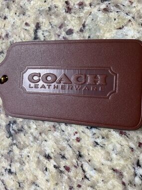 Coach XL hangtag in Maple